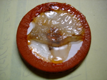 How not to glue a saxophone pad.