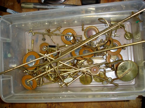 Box of saxophone keys.  Dirty, dirty saxophone keys.